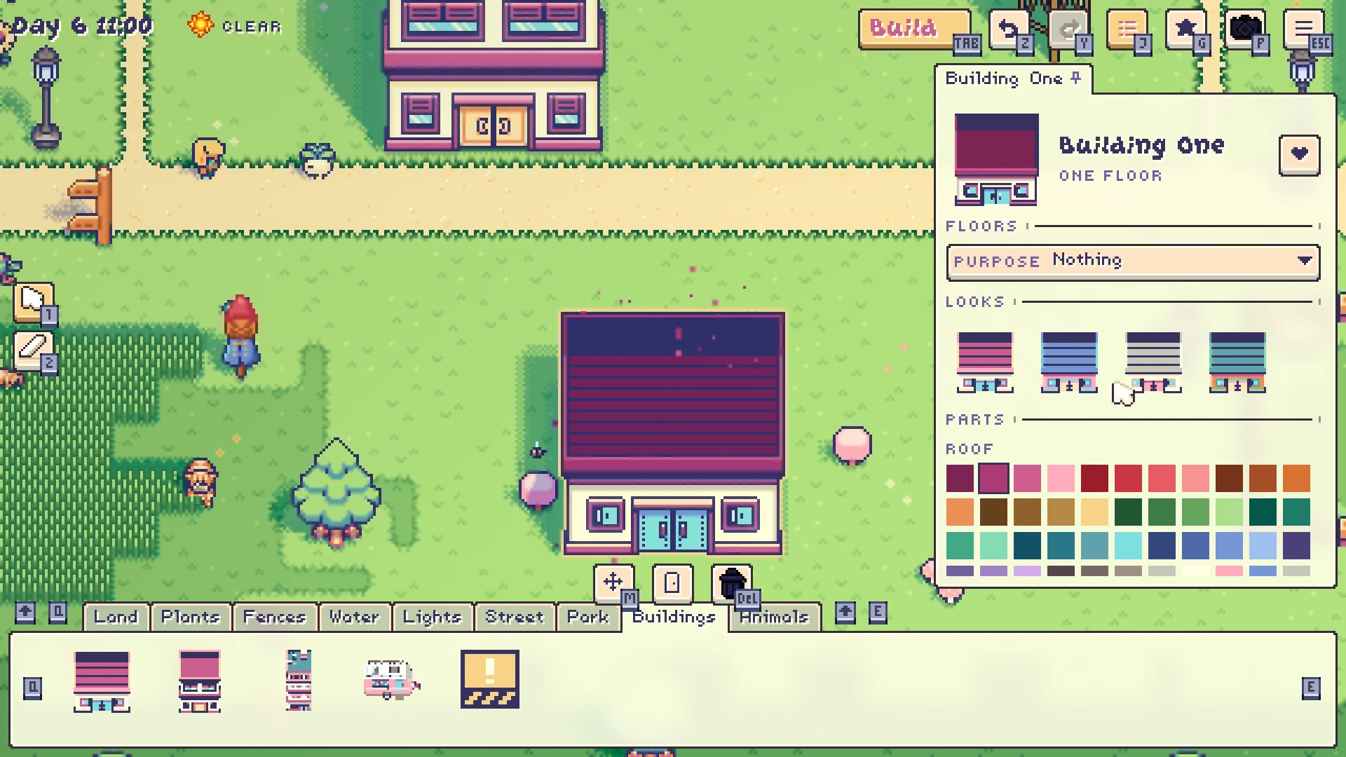 Montomo Town's build mode: a house just placed on a green lot, its color panel open with roof swatches beside it